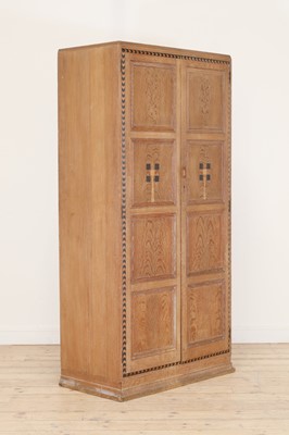 Lot 165 - A Waring & Gillow inlaid oak wardrobe