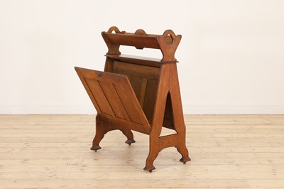 Lot 49 - An Arts and Crafts oak book trough and folio stand
