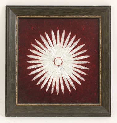Lot 66 - An unusual cut glass and foil starburst mirror