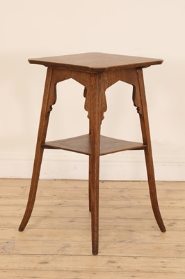 Lot 47 - A Liberty-style oak lamp table