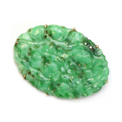Lot 1239 - A gold mounted jade plaque brooch