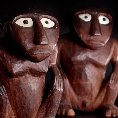 Lot 39 - A rare pair of carved wooden idols