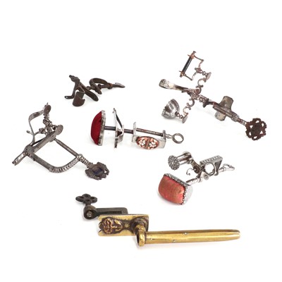 Lot 111 - Five iron sewing clamps