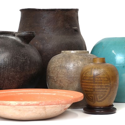 Lot 114 - Five early pottery vases and a bowl