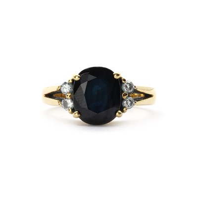Lot 1270 - A gold sapphire and diamond ring