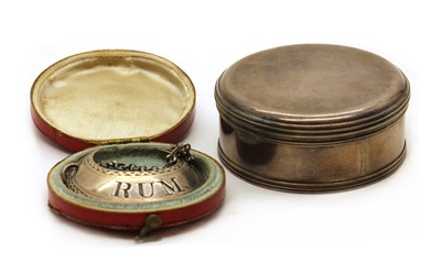 Lot 22 - A Georgian silver 'Rum' label