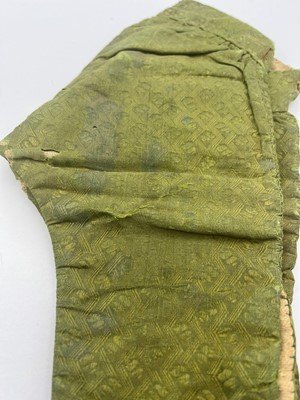 Lot 3 - A pair of green silk brocaded trousers