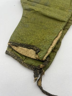 Lot 3 - A pair of green silk brocaded trousers