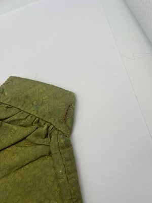 Lot 3 - A pair of green silk brocaded trousers
