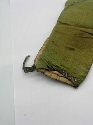 Lot 3 - A pair of green silk brocaded trousers