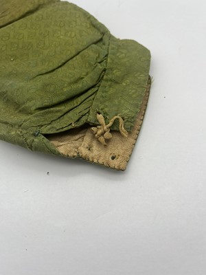 Lot 3 - A pair of green silk brocaded trousers