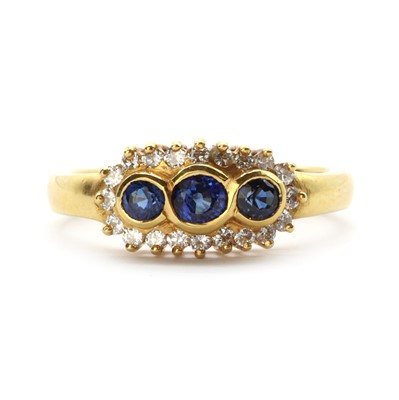 Lot 1272 - An 18ct gold sapphire and diamond ring