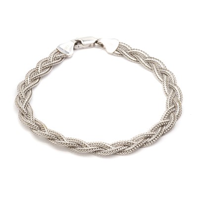 Lot 1228 - A white gold plaited bracelet