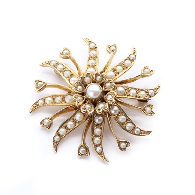 Lot 1331 - A 9ct gold split pearl sunburst brooch