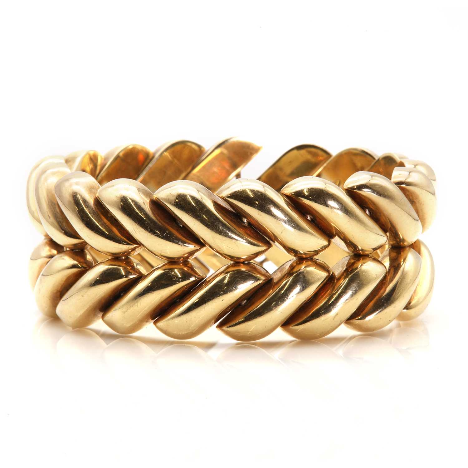 Lot 151 - A 9ct gold plaited effect hollow bracelet, by Kutchinsky, c.1960