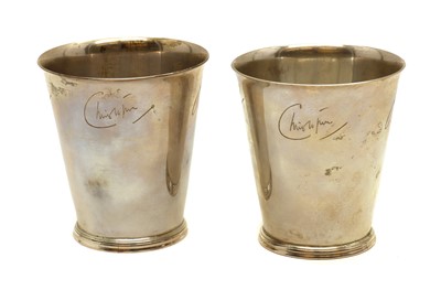 Lot 81 - A pair of silver beakers