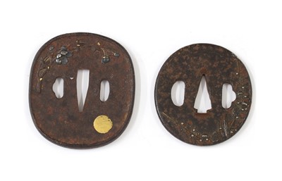 Lot 139 - A Japanese iron and gold inlaid tsuba