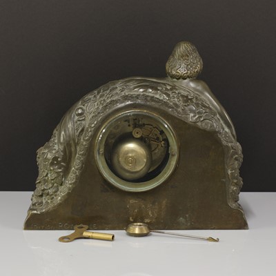 Lot 189 - An Art Deco patinated bronze mantel clock