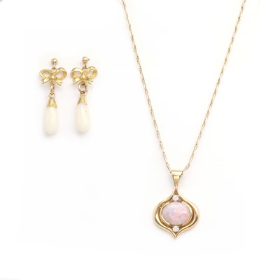Lot 1322 - A 9ct gold opal and diamond pendant