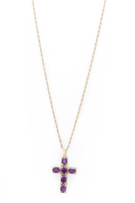 Lot 1294 - A 9ct gold amethyst set cross pendant