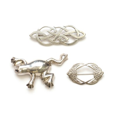Lot 1251 - Three silver brooches