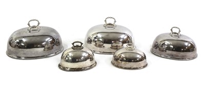 Lot 86 - Five matched and graduated silver-plated oval dish covers