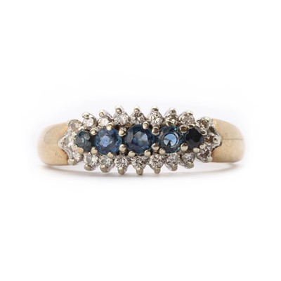 Lot 1277 - A 9ct gold sapphire and diamond cluster ring
