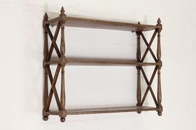 Lot 104 - A set of Regency painted wall shelves