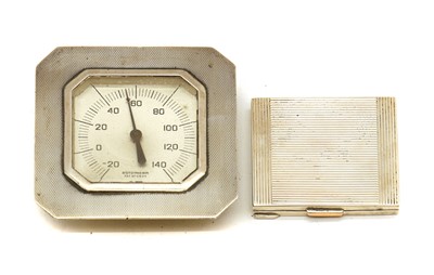 Lot 22 - A silver compact