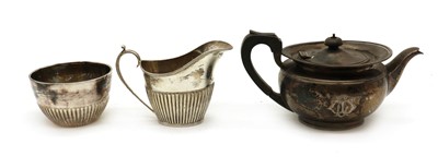Lot 51 - A composed silver three piece tea service