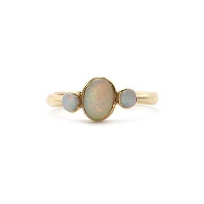 Lot 1323 - A 9ct gold three stone opal ring
