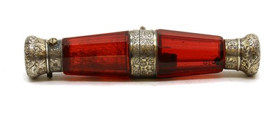 Lot 293 - A Victorian silver gilt mounted cranberry glass scent bottle