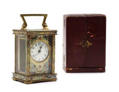 Lot 364 - A French brass and champleve enamel carriage timepiece