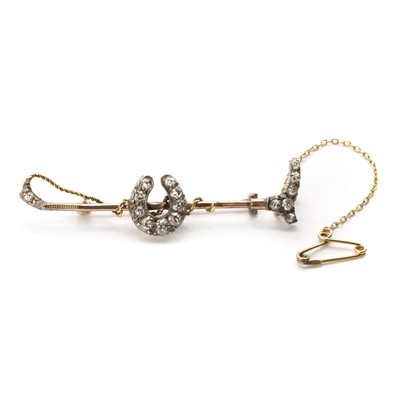 Lot 1025 - A Victorian gold and diamond set equestrian bar brooch