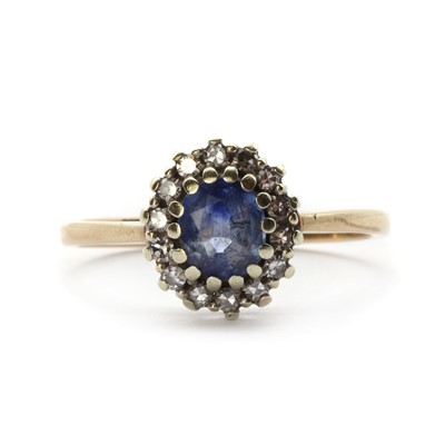 Lot 1282 - A 9ct gold sapphire and diamond cluster ring