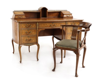Lot 539 - A Louis XV style kingwood desk