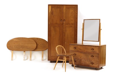 Lot 540 - An Ercol elm bedroom suite