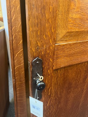 Lot 55 - A Heal & Son oak wardrobe