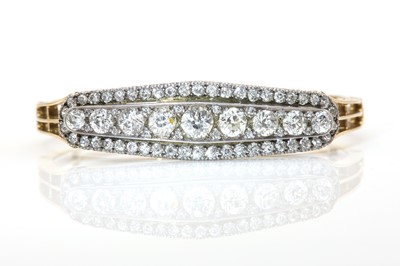 Lot 62 - A Continental style diamond set hinged bangle, c.1890