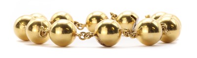 Lot 1109 - A French gold bead bracelet