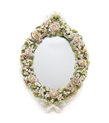 Lot 252 - A Meissen style porcelain mirror