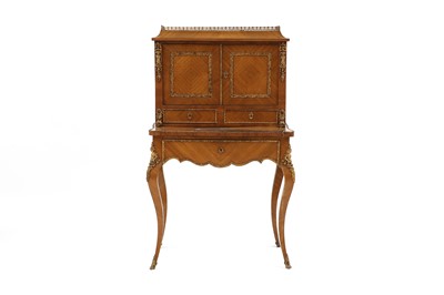Lot 586 - A Louis XV style kingwood bureau du dame