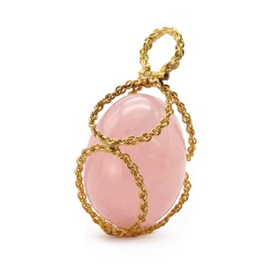 Lot 1306 - A gold rose quartz pendant