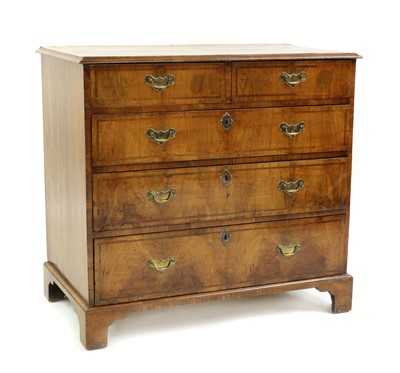 Lot 468 - A walnut chest of drawers