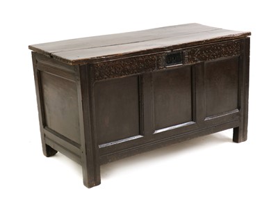 Lot 380 - An oak panelled coffer