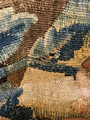 Lot 473 - A verdure tapestry fragment