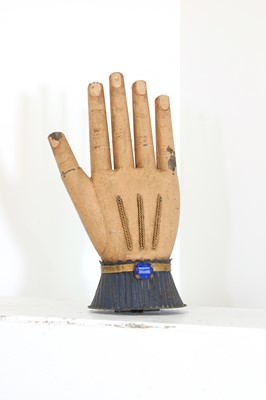 Lot 533 - A painted toleware glovemaker's hanging sign