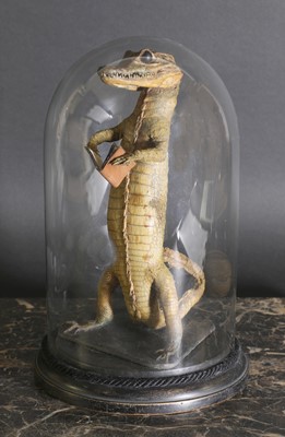 Lot 60 - An anthropomorphic taxidermy of a juvenile crocodile