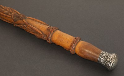 Lot 18 - A regimental folk art fruitwood cane