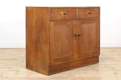 Lot 214 - A Gordon Russell oak sideboard